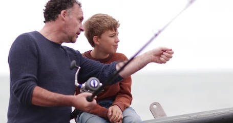 Father teaching Son how to fish - Powered by Adobe