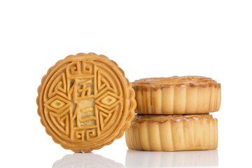 Mooncake isolated on the white table. Chinese mid autumn festival food. 