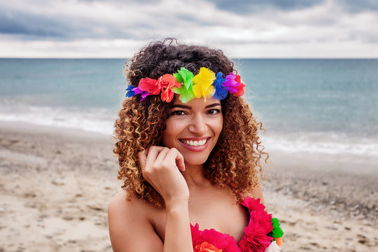 Smiling Hawaiian woman on the beach