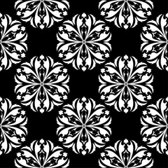 White floral design on black background. Seamless pattern