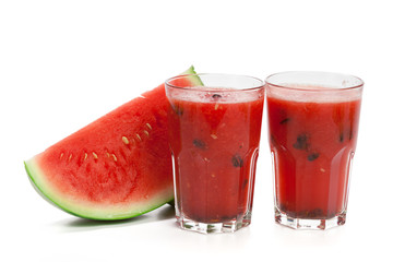 Watermelon drink in glasses with slice