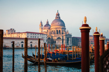 Fototapeta na wymiar Grand Canal with gondolas and s Santa Maria della Salute church, Venice, Italy