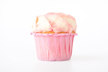 Pink cupcake with white whipped cream in form of flower on white background. Picture for a menu or a confectionery catalog. Cutout.