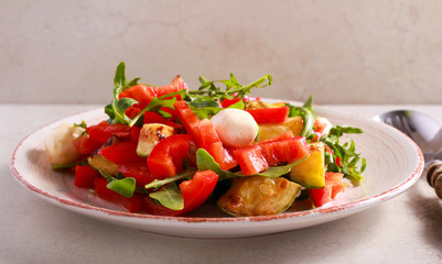 Zucchini, rocket, red pepper and mozzarella salad
