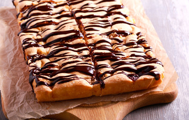 Sponge fruit cake with chocolate drizzle