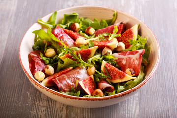 Figs, rocket, ham and nut salad