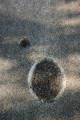 hydrant covers are photographed from above during the road construction