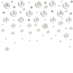 Falling different sized shimmering luxury pearls isolated on white background