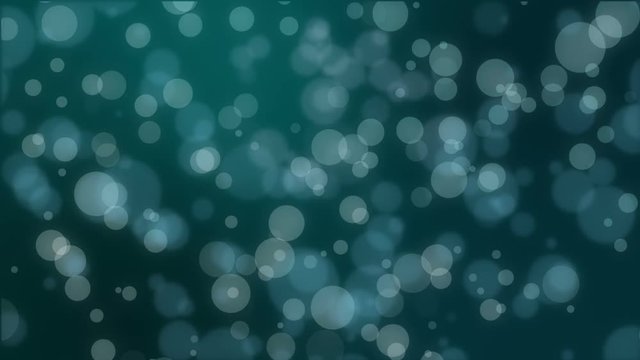 Magical dark teal glowing bokeh background with floating light particles.