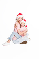 mother and daughter hugging on christmas