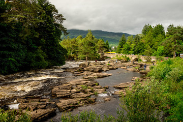 Fototapeta na wymiar Running falls of Dochart in a town of Killin in central Scotland