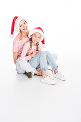Obraz premium mother and daughter embracing on christmas