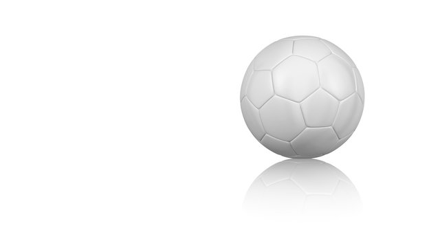 Handball ball on a reflecting white floor