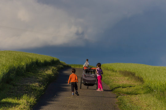 Kids walking the country road