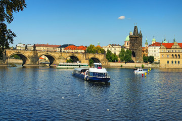 Prague, The Czech Republic: AUGUST 23, 2017- A tourist river boat on the Vltava river. View of the...