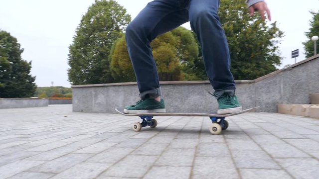 Skateboarder Jumping Down the Stairs in Skatepark. HD Slowmotion in 180fps.