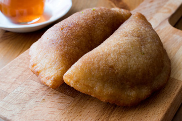 Turkish Dessert Tas Kadayif with walnuts.