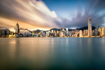 Fototapeta na wymiar Hong Kong City skyline at sunrise. View from across Victoria Harbor Hongkong.