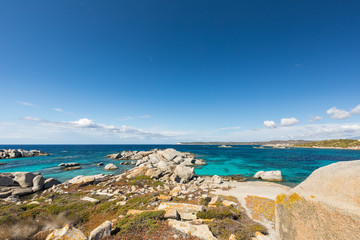 Fototapeta na wymiar Rocky coastline and translucent sea at Cavallo island near Corsica