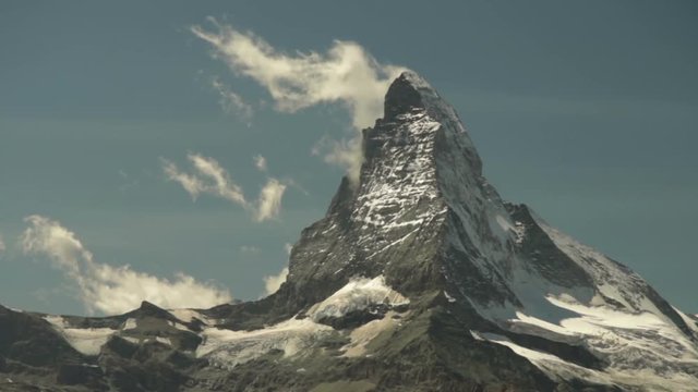 Time lapse clouds move above swiss symbol iconic mountain Matterhorn near lake Stellisee  travel Europe Switzerland Zermatt Alps timelapse