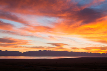 Fototapeta na wymiar Sunset on Song Kul Lake in Kyrgyzstan