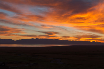 Fototapeta na wymiar Sunset at Song Kul Lake in Kyrgyzstan
