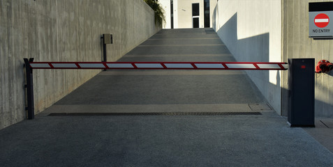 Automatic barrier at the entrance to the parking lot.