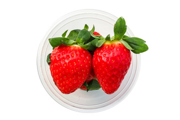 Strawberry in cup white background.