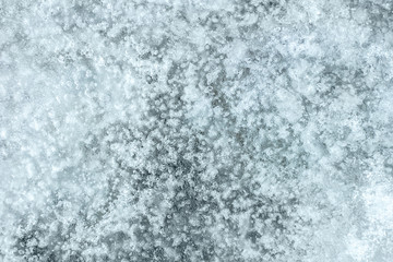 Fototapeta na wymiar Frosted ice close up texture blue white