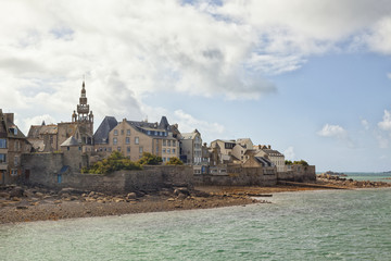 Old town of Roscoff, Brittany, with town wall and church