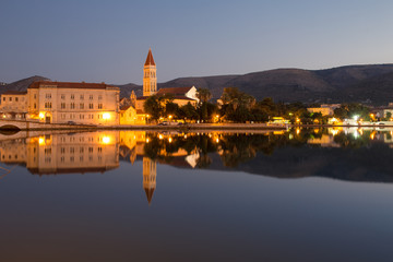Obraz premium Waterfront view of beautiful Trogir, Croatia - Unesco World Heritage Site. Image take before sunrise, at the blue hour.