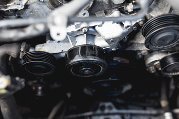 Close up shot of open car engine. Details and parts.