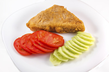 Breaded yellow-cheese with fresh vegetables