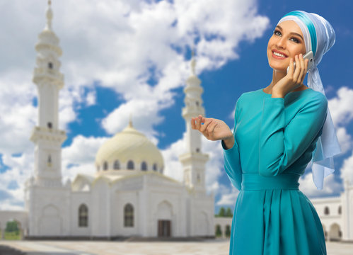 Muslim woman at mosque background