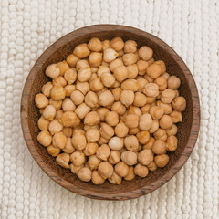 Chickpeas in the wooden bowl