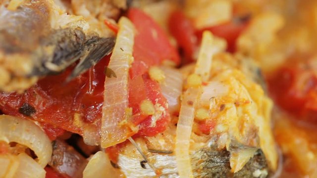 Fried pollock with onions