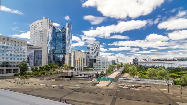Skyscrapers of La Defense timelapse hyperlapse modern business and financial district in Paris with highrise buildings and convention center