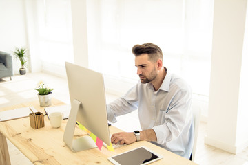 young man working with computer