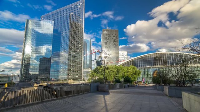 Skyscrapers of La Defense timelapse hyperlapse modern business and financial district in Paris with highrise buildings and convention center