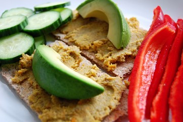 healthy vegan breakfast with avocado and hummus - 174738359