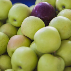 Bunch of green apples in supermarket
