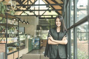 Modern business woman in the office with copy space, smiling business woman. Middle age beautiful and smiling business woman. Selective focus