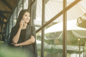 Modern business woman in the office with copy space, smiling business woman. Middle age beautiful and smiling business woman. Selective focus