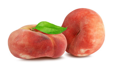 Two chinese flat donut peaches with leaf isolated on white with clipping path