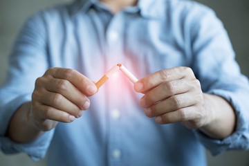 Man risky heart disease refusing cigarettes concept for quitting smoking and healthy lifestyle.or...