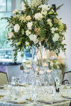 Extravagant floral table decoration for wedding reception