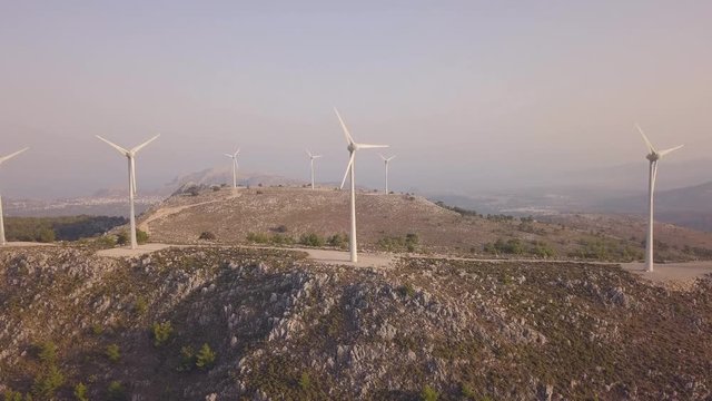 Aerial view of wind farms on hills