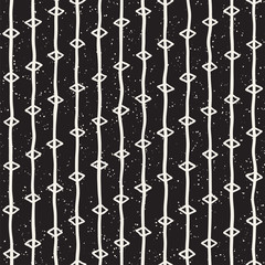 Seamless pattern with hand drawn lines. Abstract background with freehand brush strokes. Black and white texture. Ornament for wrapping paper.