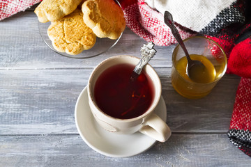 cup of hot tea with honey