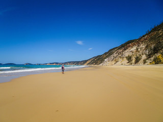 Walking on Rainbow Beach in Queensland